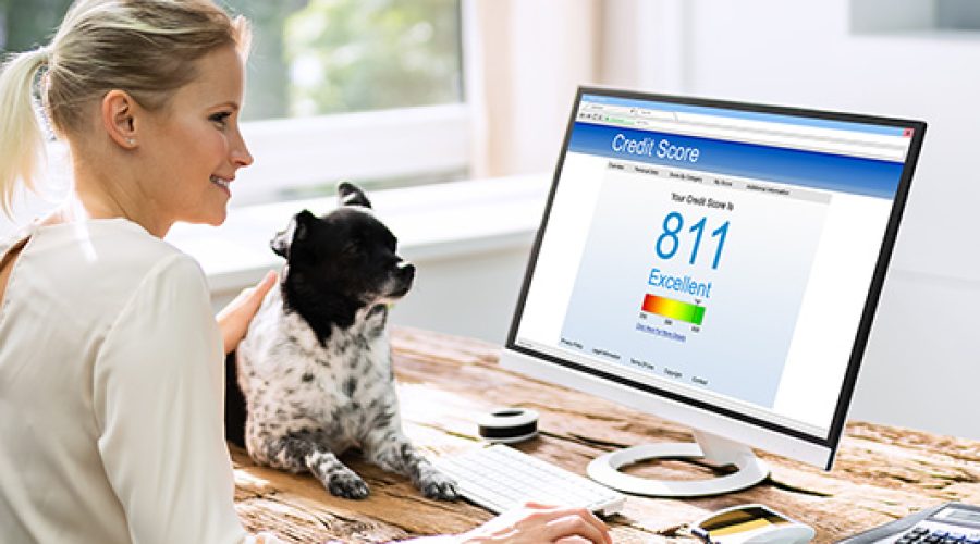 Woman checks her VantageScore® credit score to see if she will prequalify for a mortgage.